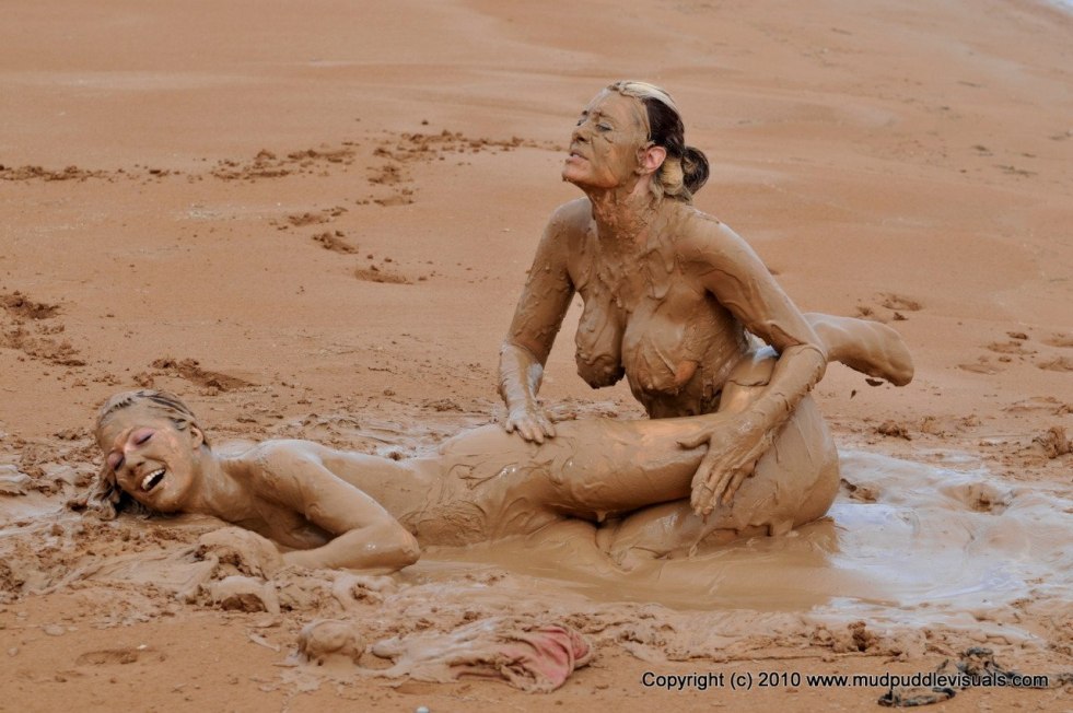 Naked girls in mud