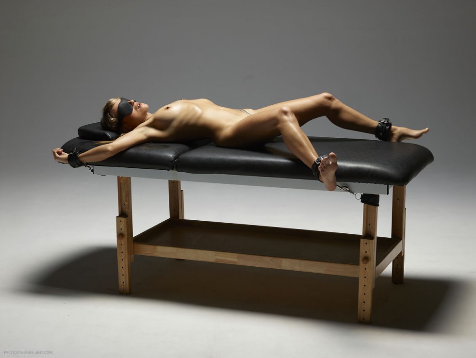 Woman tied to the table