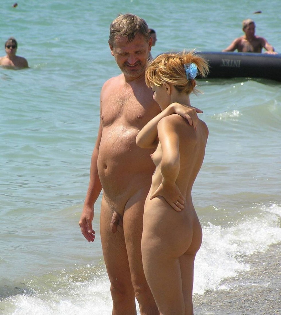 Naked married couple on the beach