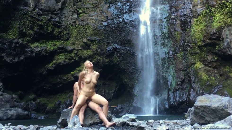 Elegant fucking from a waterfall