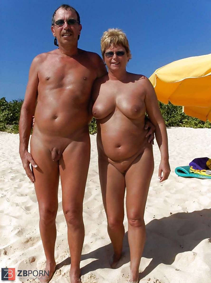 Naked mature couples on the beach