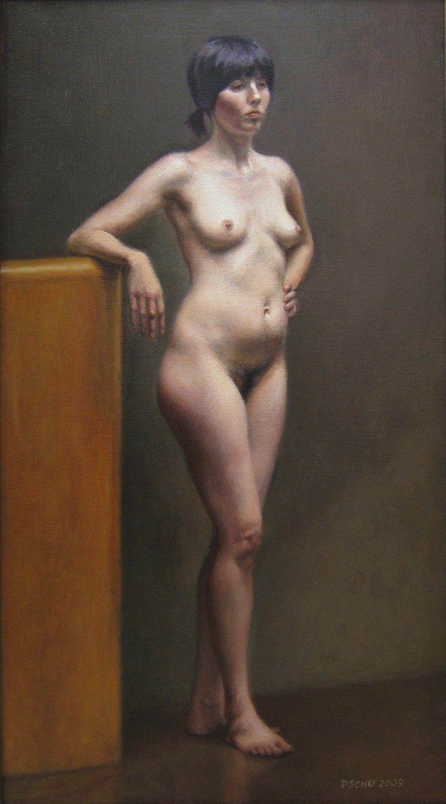 Naked women posing by an artist