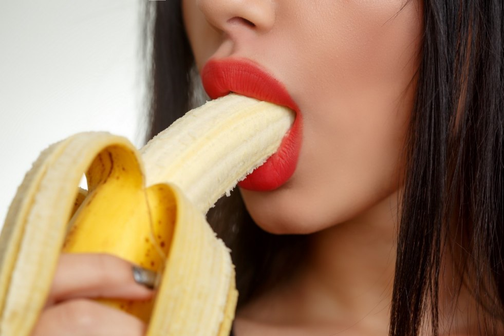 Brunette with banana