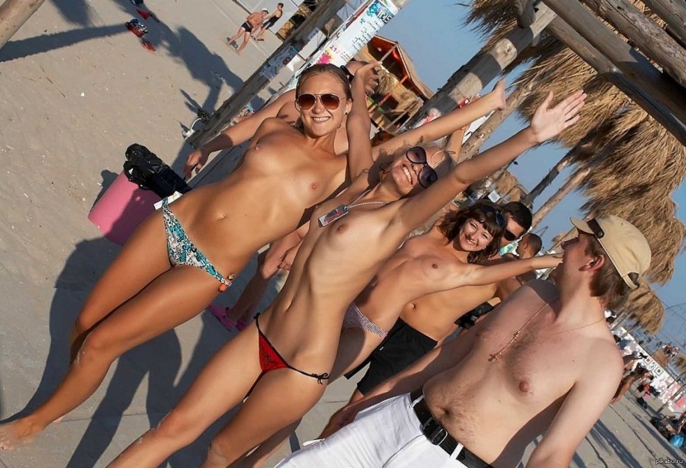 Spread his legs on the public beach