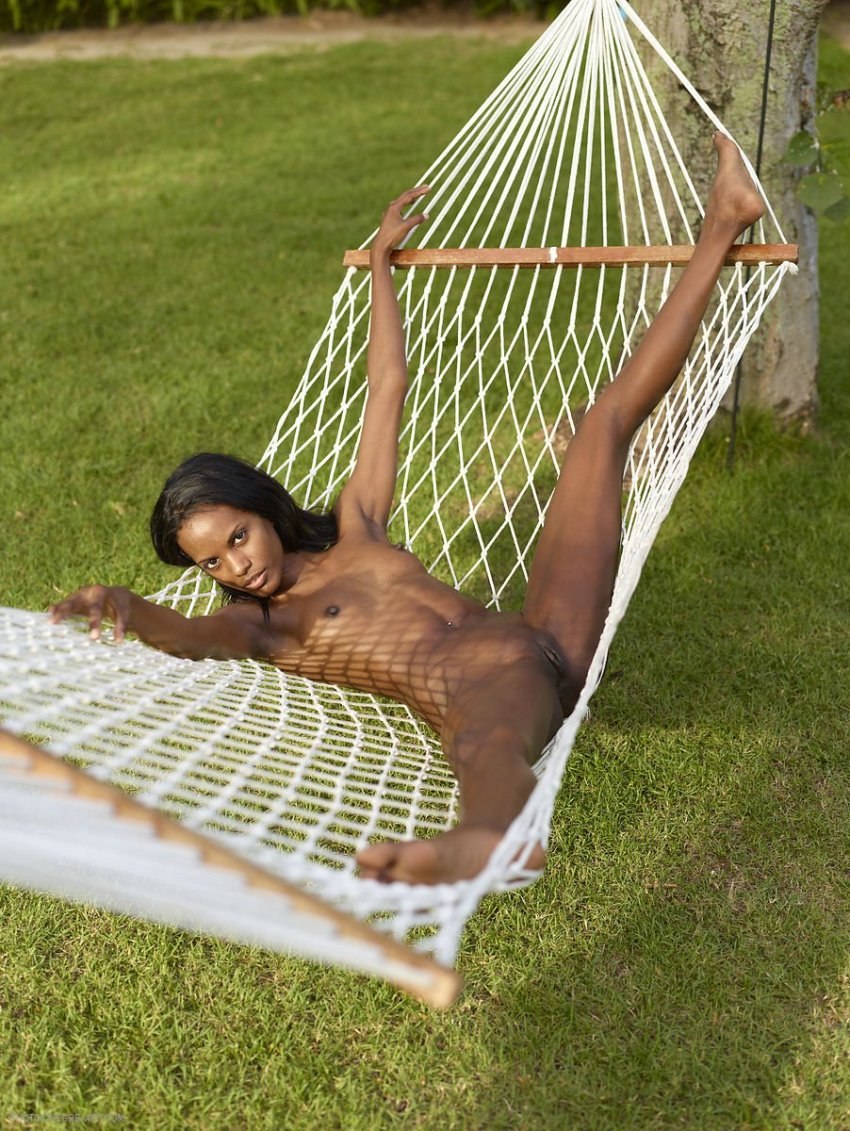 Naked friends in hammock