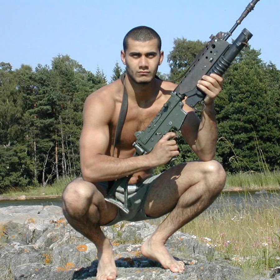 A man with a machine gun