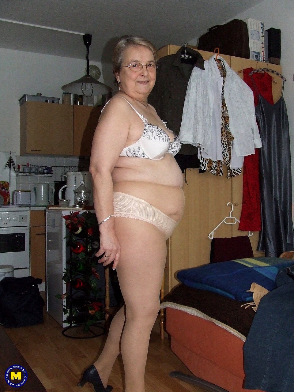 Full woman in the kitchen