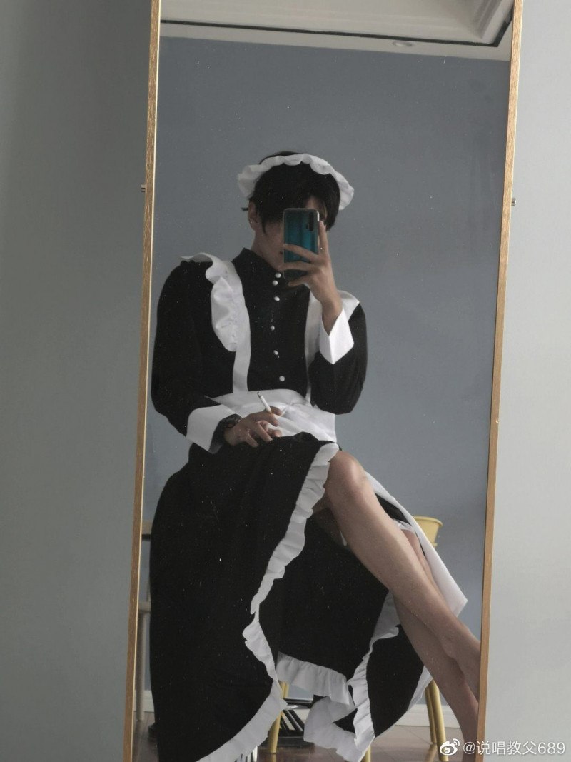 A guy in a suit of a maid