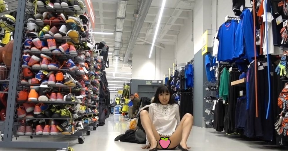 Girl without a bra in the store