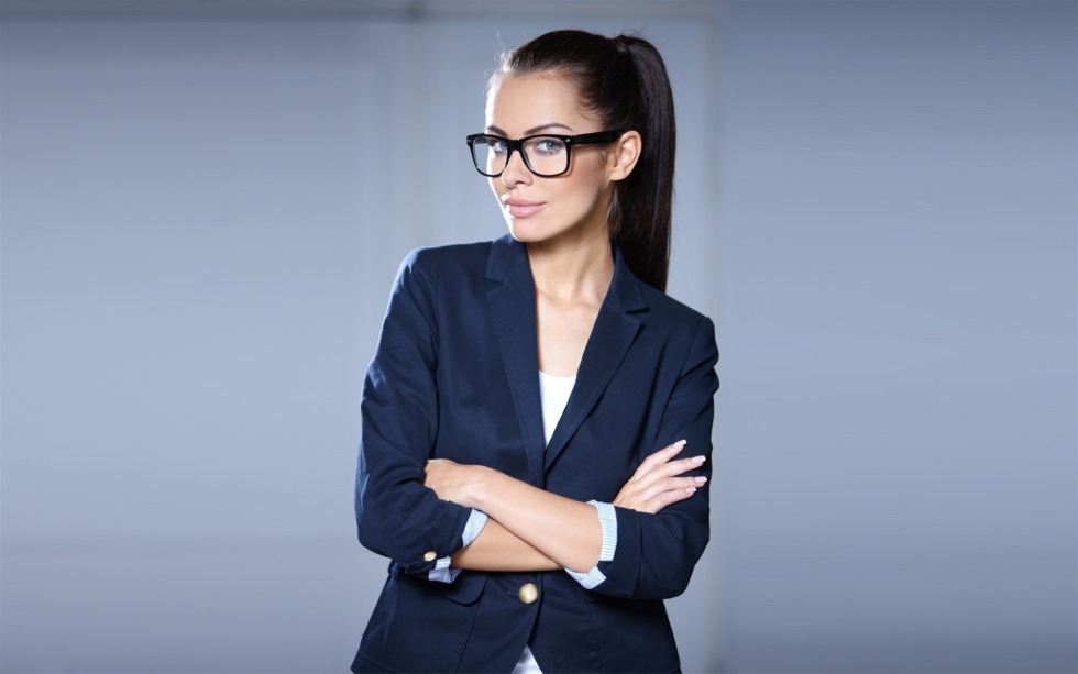 Girl in a suit and glasses