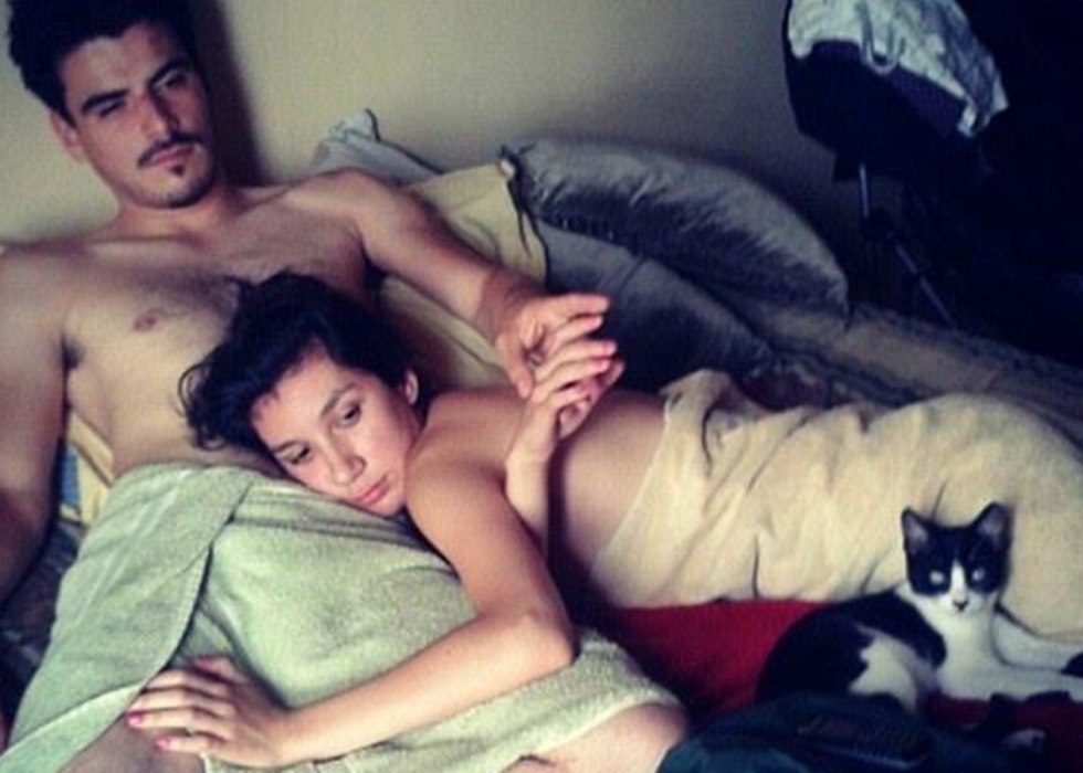 Sports couple in bed