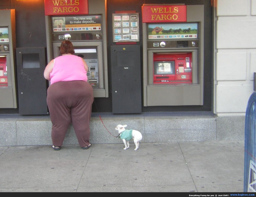 Fat woman with a little dog