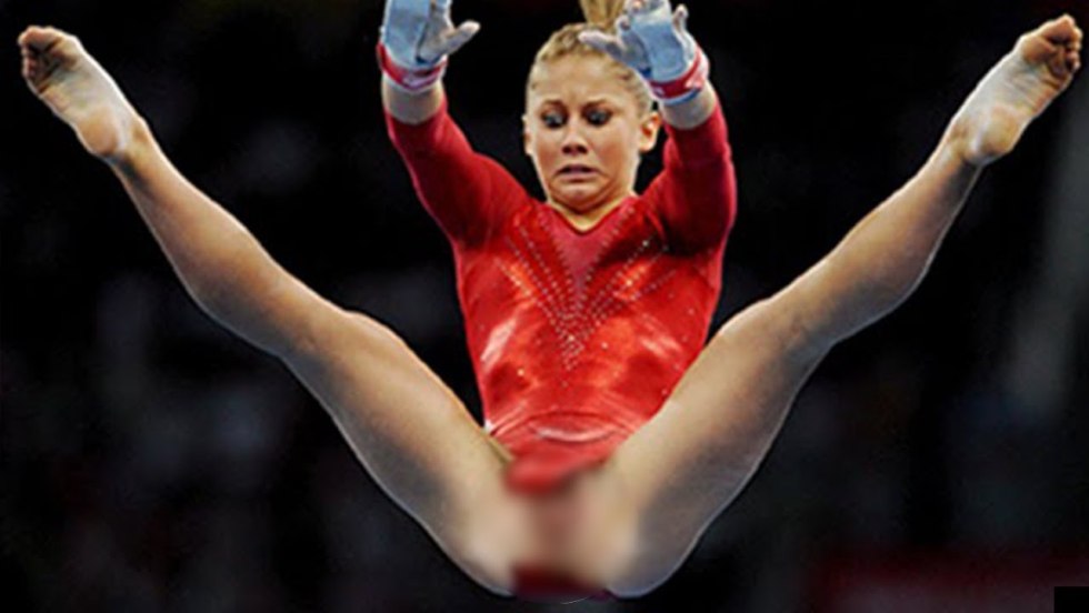 A naked athlete squats