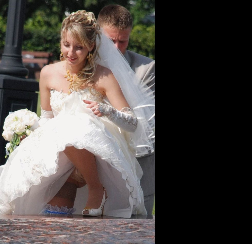 A girl with a raised skirt