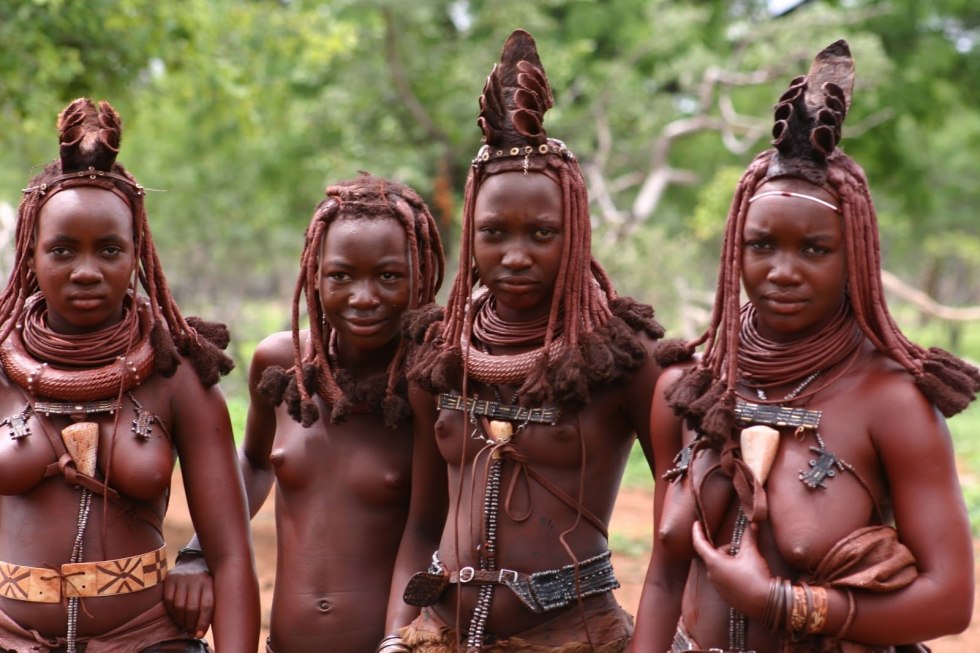 Sitting girls from African tribes