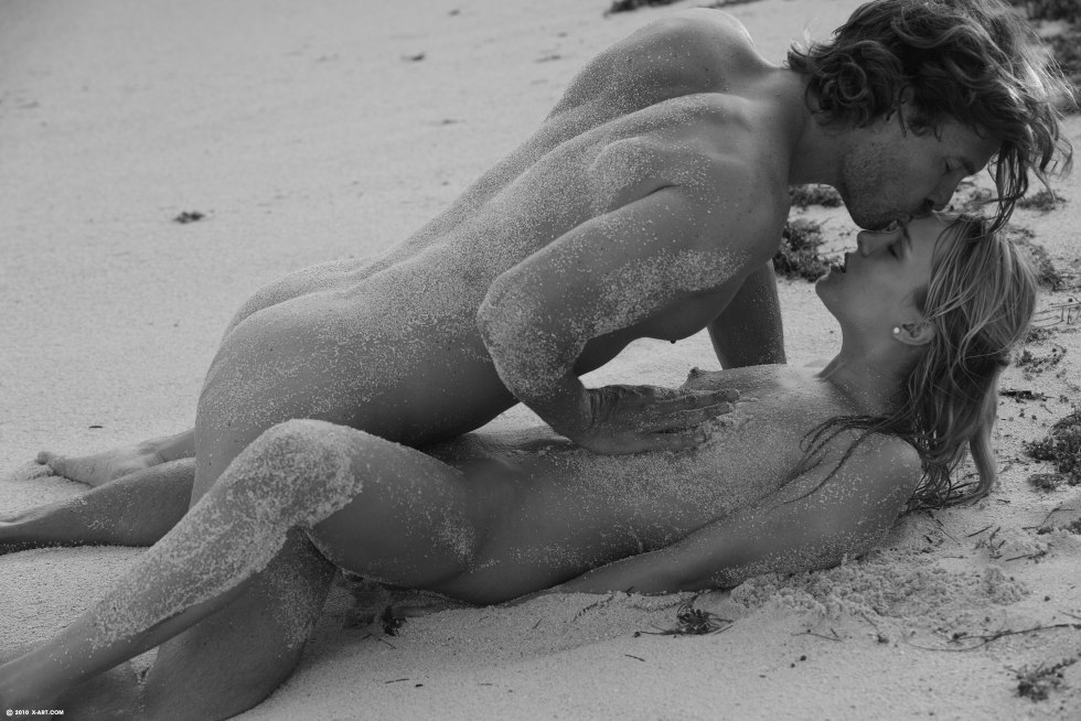 Beautiful couple on the beach nude