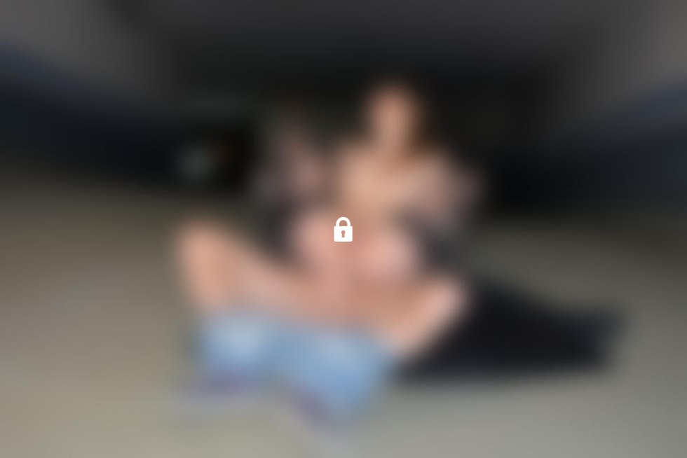 Naked women among dressed men