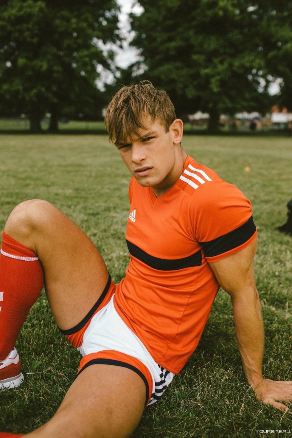 Beautiful young men in shorts