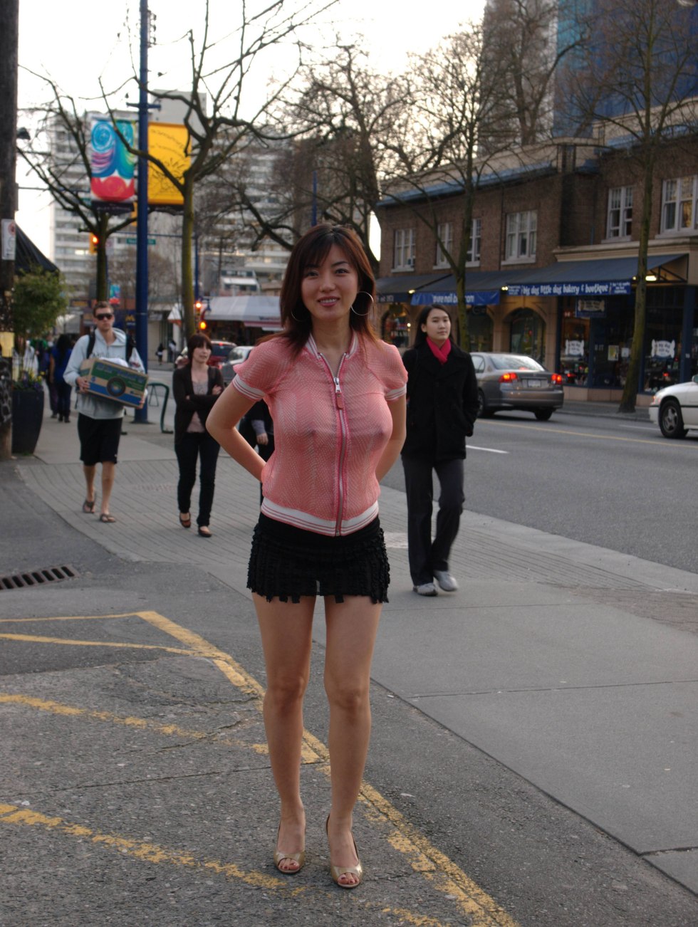 Women in dress and stockings without panties in public