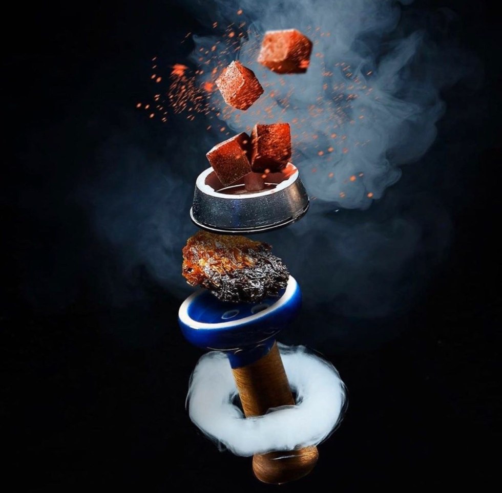 Girl with hookah lying