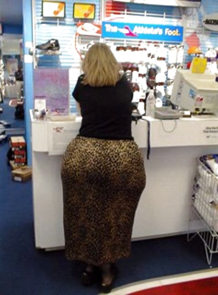 Woman with a big booty in the store
