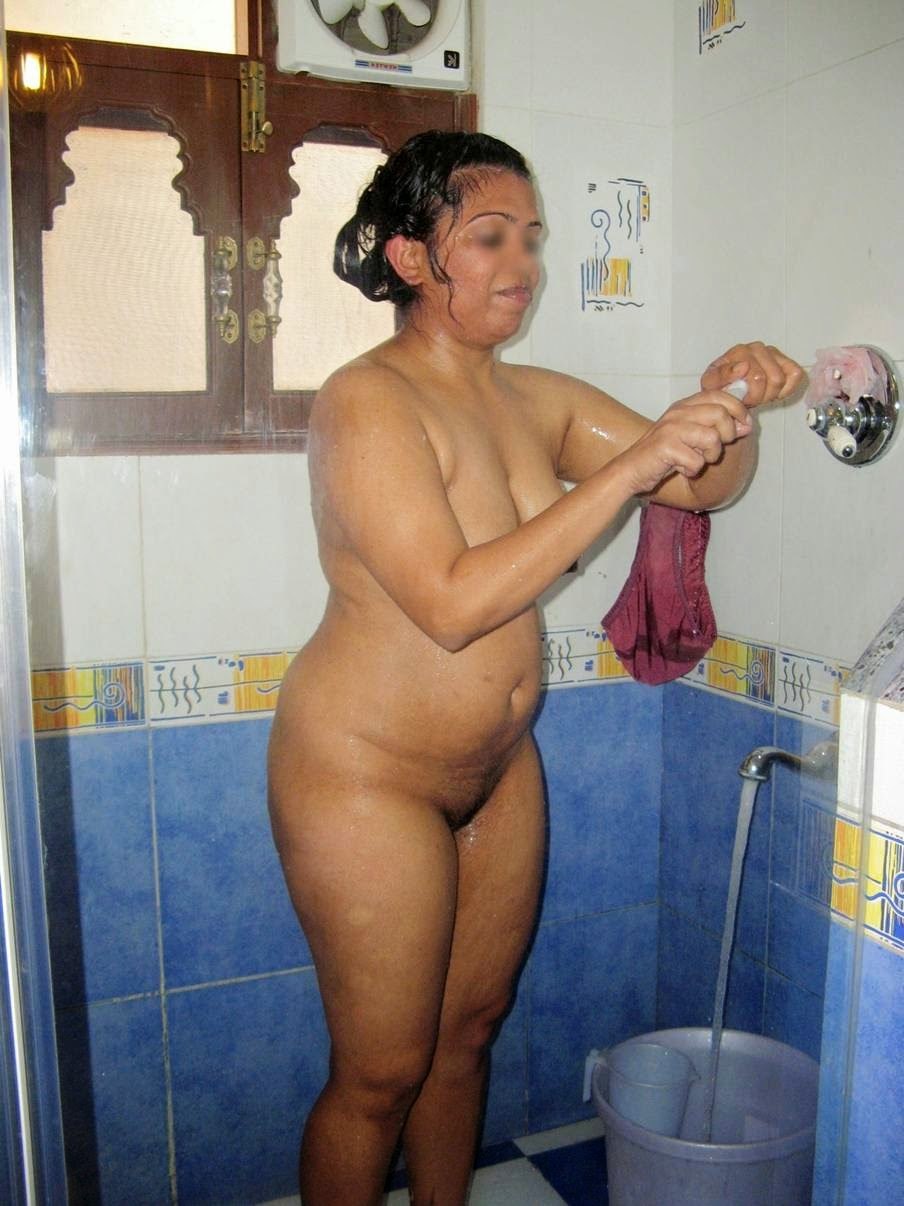 Naked Indian women wash