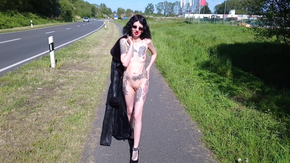 Woman naked on the street