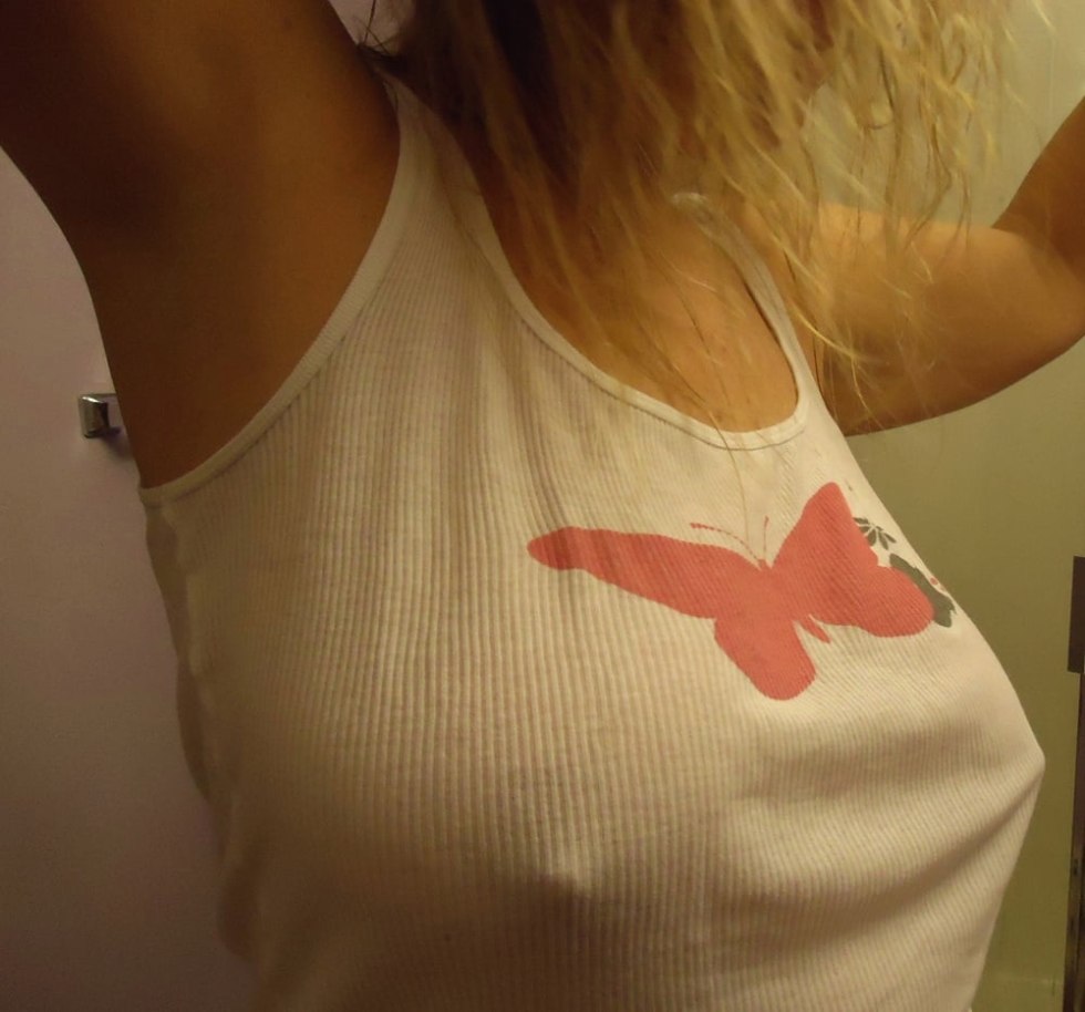 Tits in the top without a bra from the upper angle