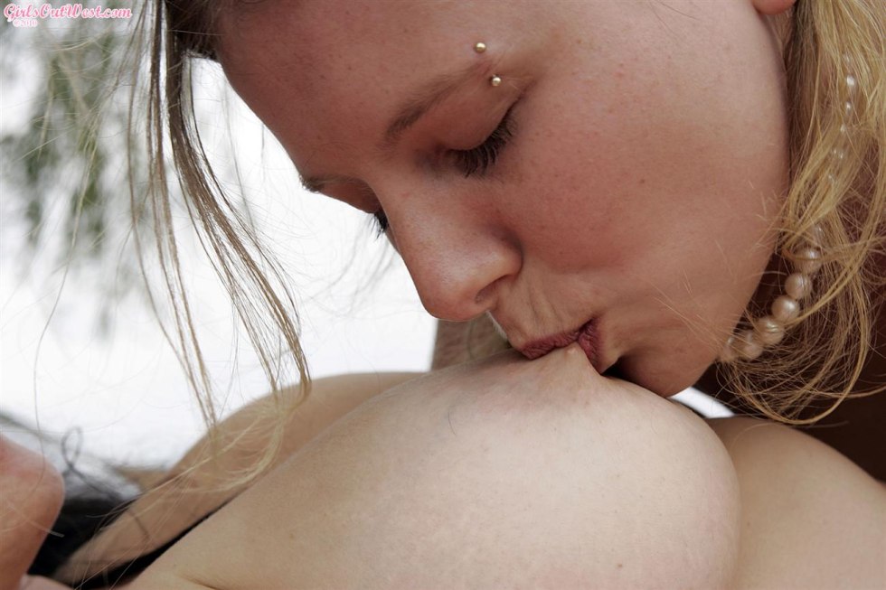 Girl licks boobs to a girl