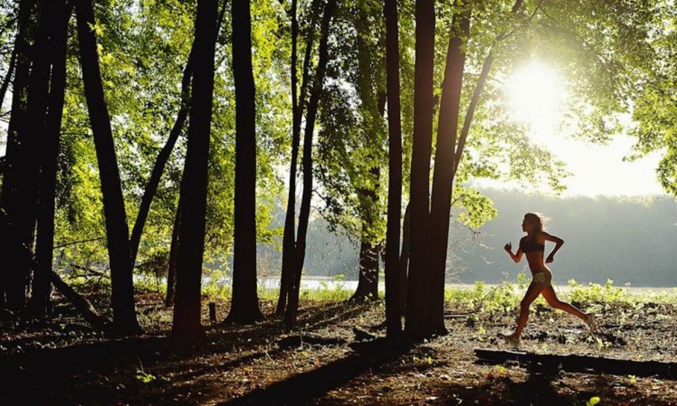 Girl runs in the forest