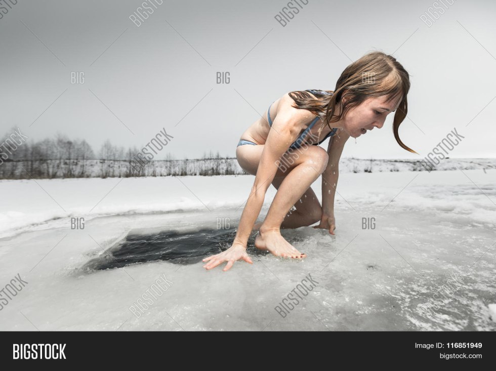 Girl swims with ice