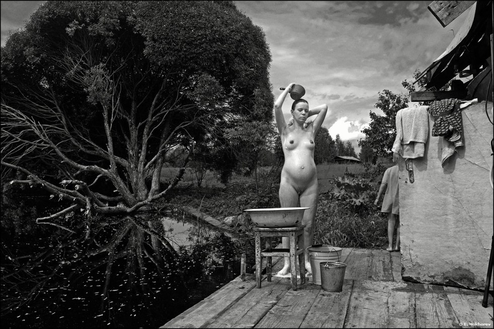 Lucy Wilde in a sauna with two men