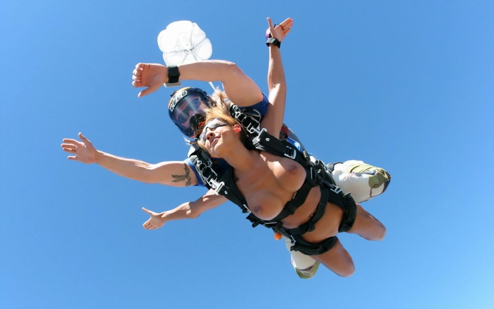 Porn actor with a parachute on the shoulder