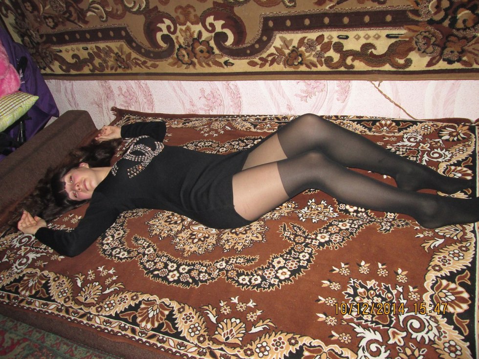 Woman on the background of the carpet