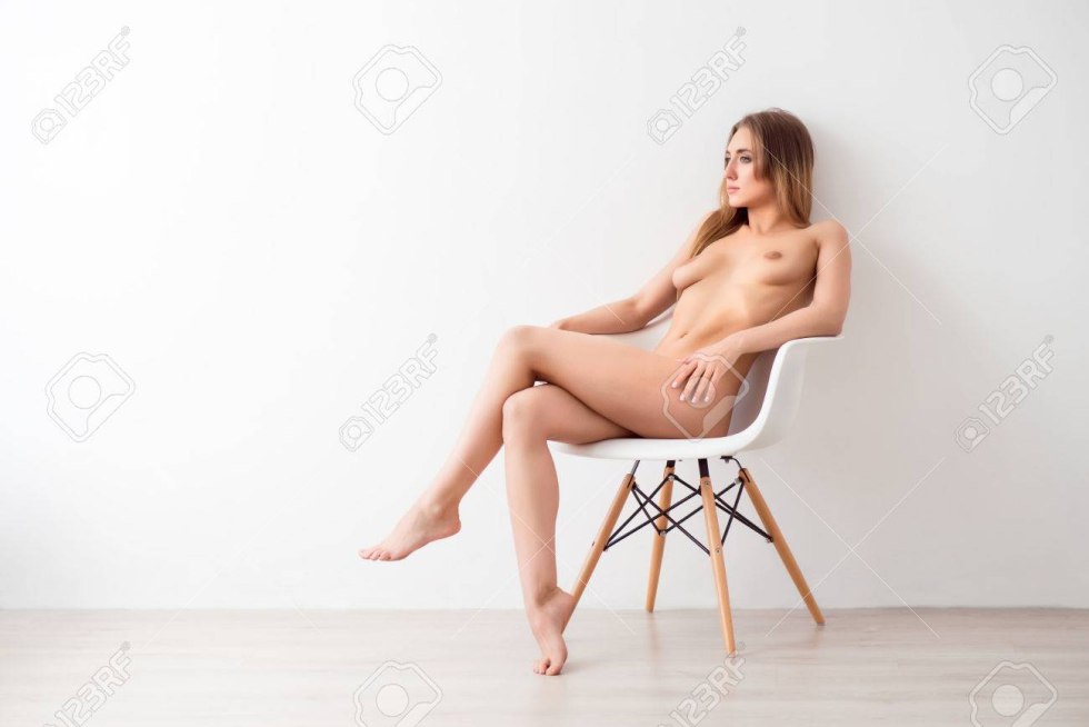 Girl on a chair without panties