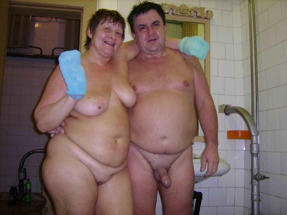 Naked women in a bathhouse with men