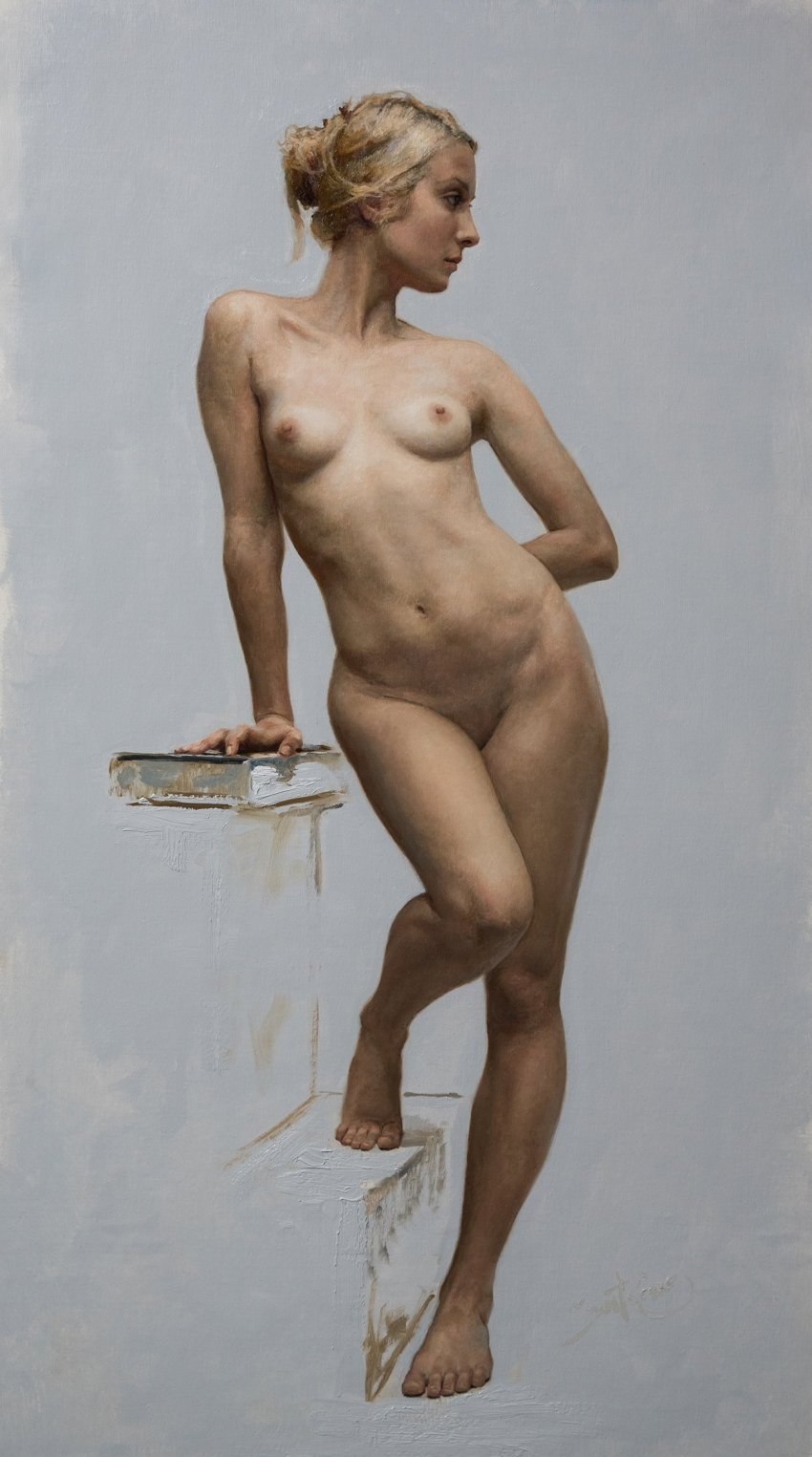 Naked posing the artist