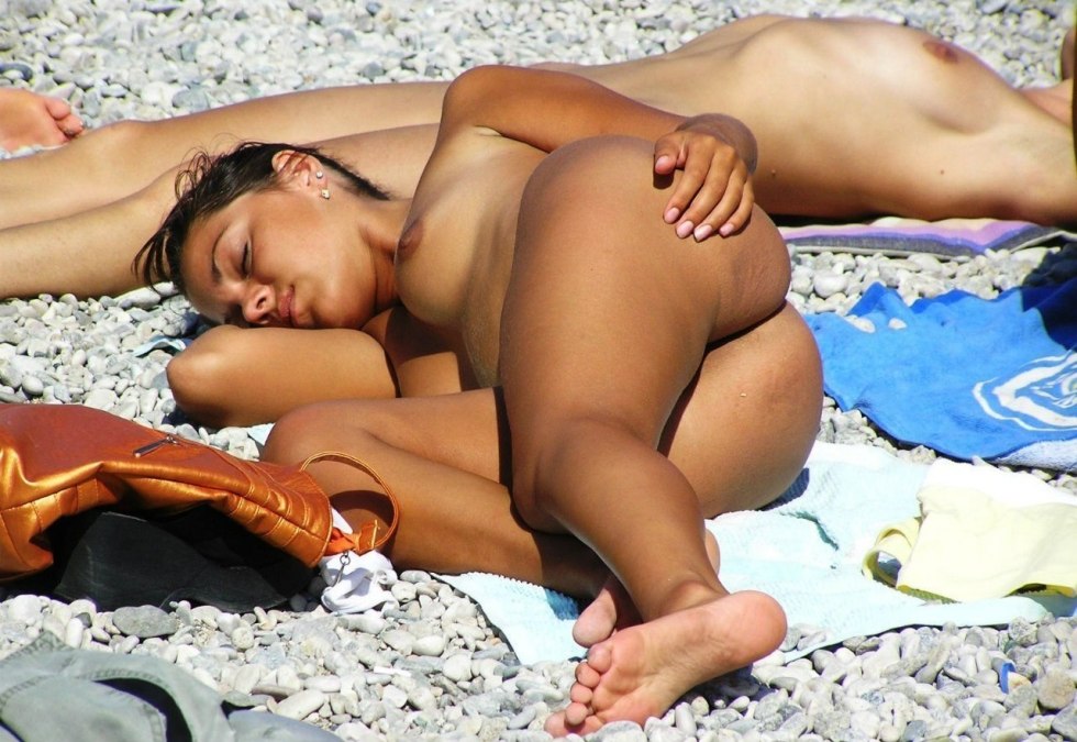 Mature women on the beach spied